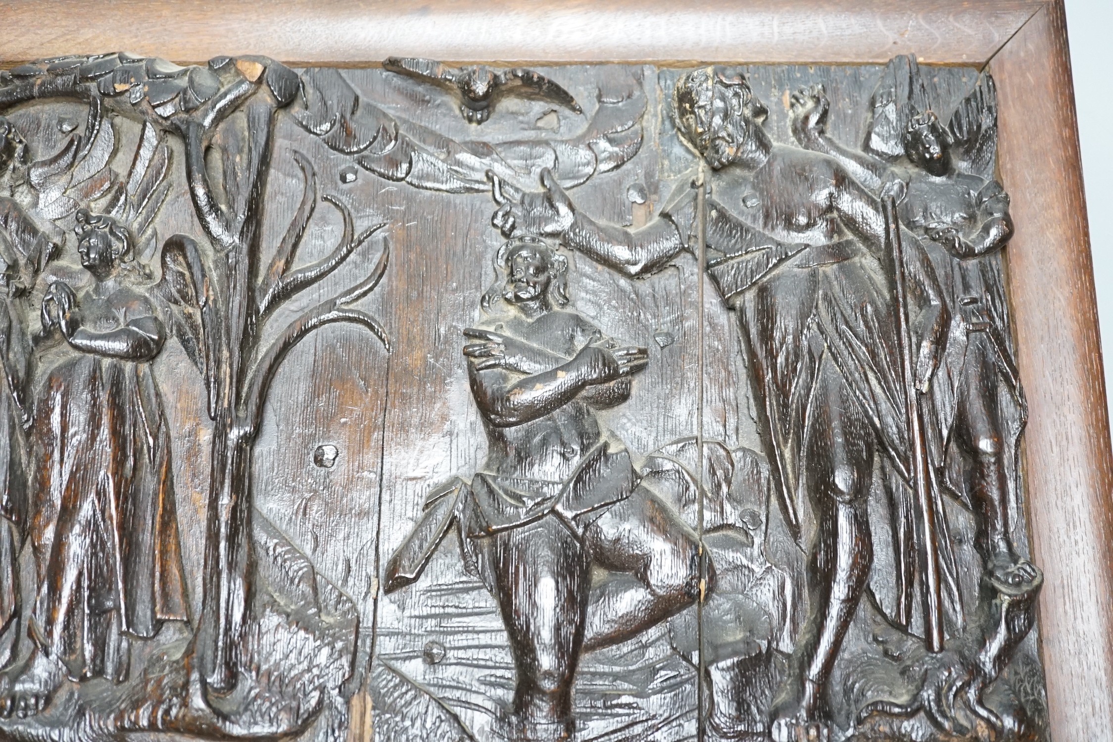 An antique rectangular carved oak panel, later frame, 25x40cm excl frame